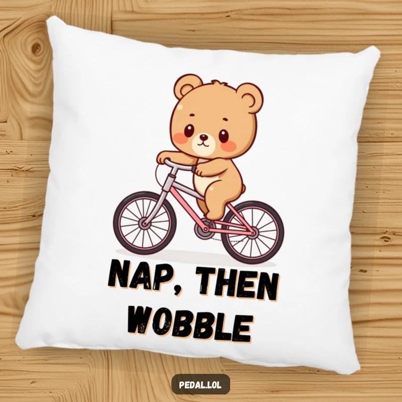 Funny Bear Cub Wobble Pillow: A soft, plush pillow showcasing a bear cub’s funny, wobbly bike ride, perfect for a funny gift.