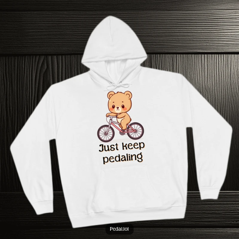 Funny Bear Cub Wobble Hoodie: A soft hoodie featuring a bear cub wobbling precariously on a bicycle, perfect for a funny gift.
