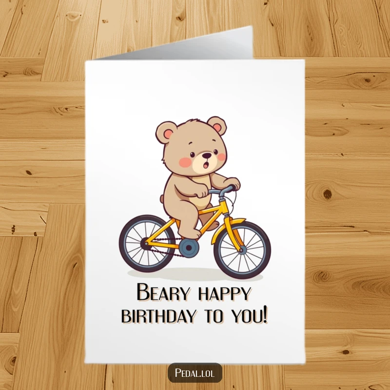 Funny Free Printable Birthday Card: Determined bear straining to pedal a yellow bike uphill.