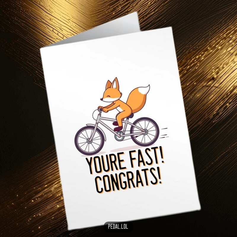 Funny free printable congratulations card showing a fox joyfully racing a bicycle, celebrating a big win.