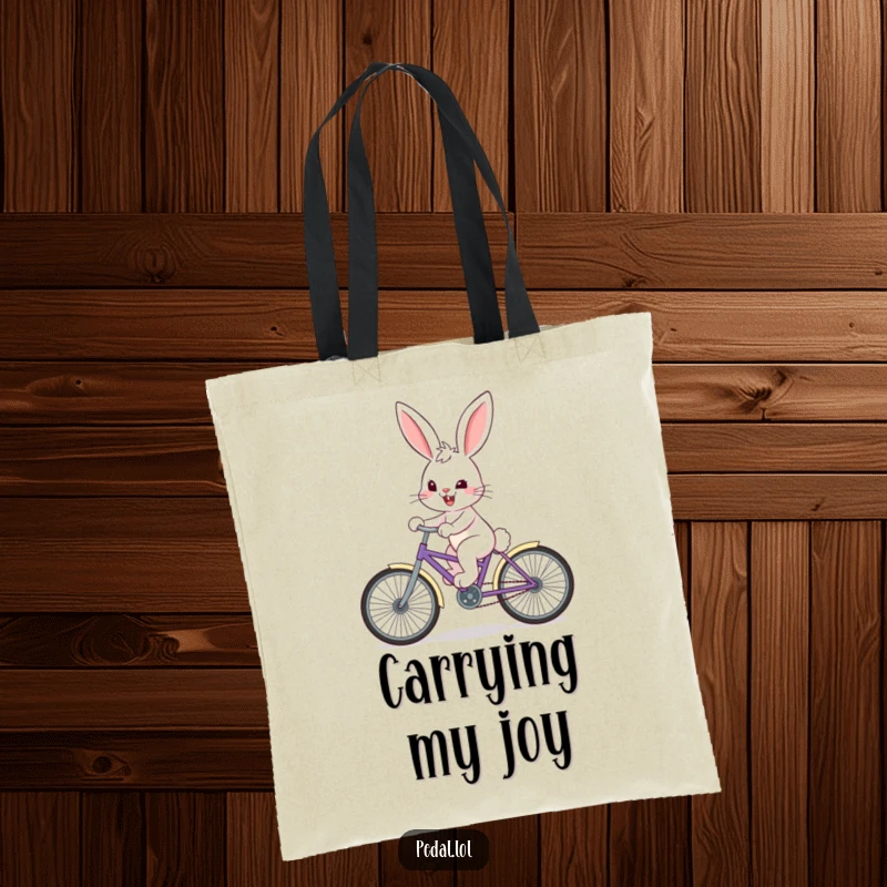 Funny Bunny Tote Bag: A happy bunny with a determined grin pedals a bike, perfect for carrying items.